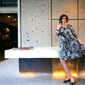 Wonderful stretchy Rayon dress! Black and white, embellished imported fabric.